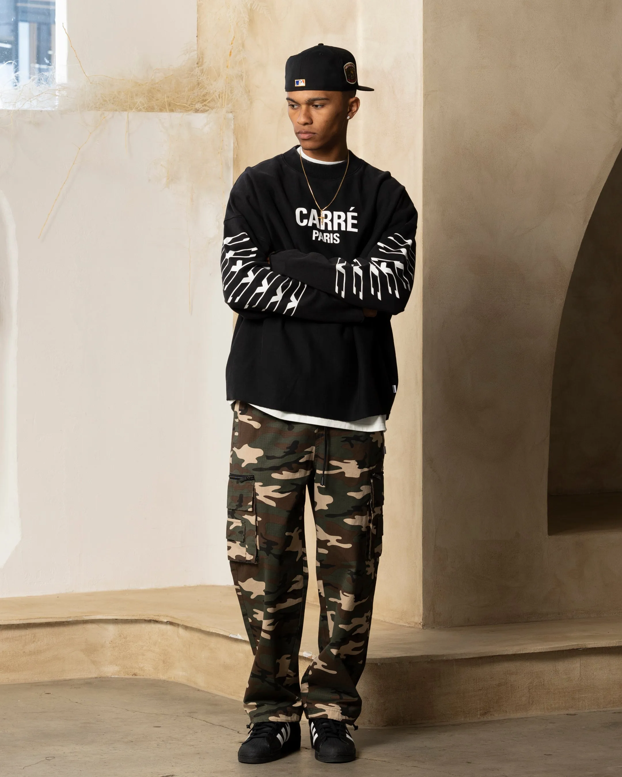 Carre Revolution Cut Off Oversized Crewneck Washed Black